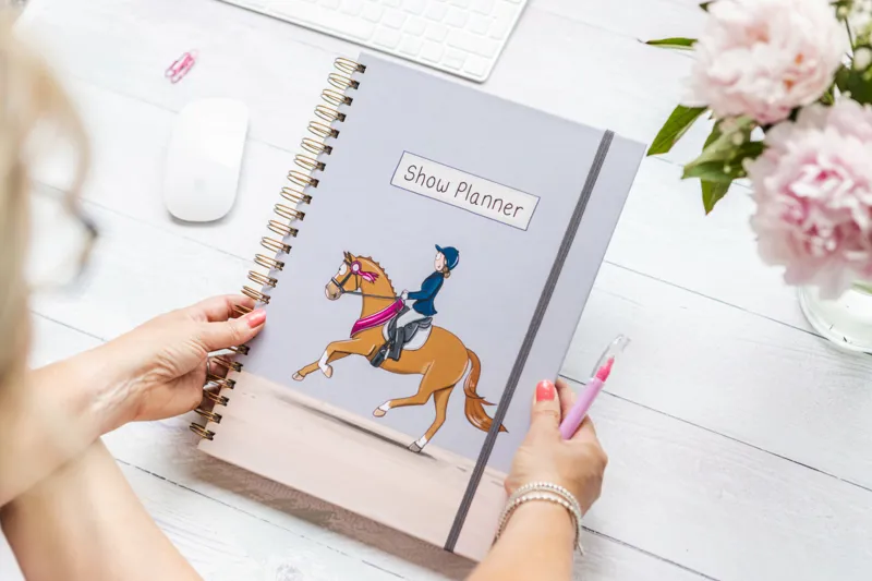 Emily Cole Show Planner Book in Assorted